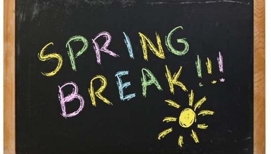 Chalkboard with spring break and sun on it